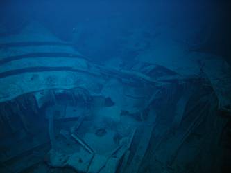 Large piece of twisted steel plate on seabed